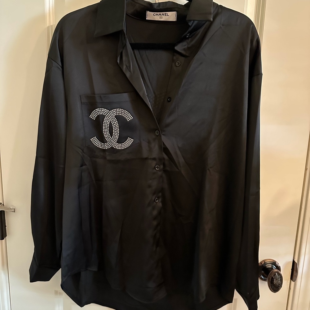 CHANEL Black Satin Shirt with Rhinestone Emblem
